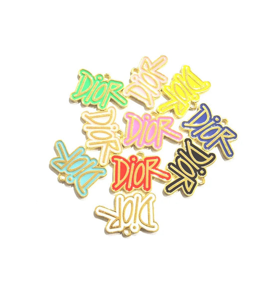 GOLD Colorful Graffiti Dior Charm with vibrant, designer-inspired graffiti design, ideal for creating bracelets, necklaces, keychains, purse charms, and shoe embellishments. Perfect for DIY fashion lovers and those seeking unique luxury accessories.