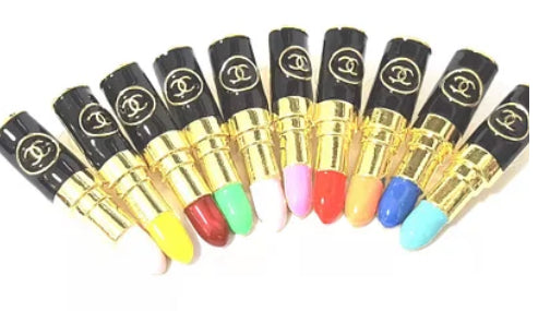 Gold Designer-inspired CC lipstick charms with rhinestone accents, perfect for bracelets, necklaces, keychains, purse charms, and shoe embellishments. Luxurious and customizable accessories for fashion enthusiasts, DIY crafters, and those seeking unique, high-quality jewelry pieces