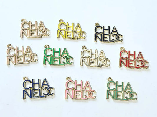 Gold Vibrant C H A N E L Charm designed for bracelets, necklaces, keychains, purse charms, and shoe embellishments. Perfect for DIY crafters, luxury seekers, and fashion-conscious individuals looking for designer-inspired accessories.