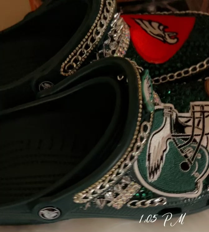 Philadelphia Eagles Custom Crocs featuring team logo, rhinestones, and chains for a stylish fan accessory.