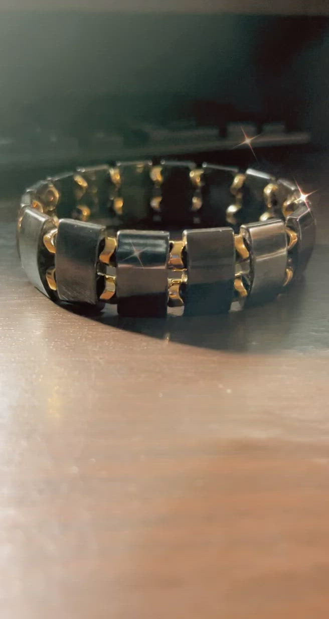 PREEMINENCE' Unisex Beaded Bracelet: Gold Tone Accents and Hematite Brilliance. - Video